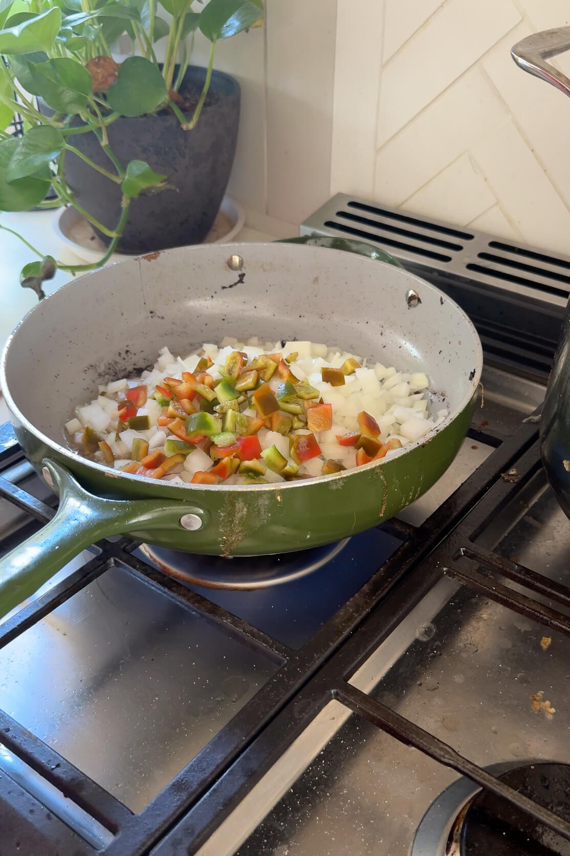 Sautéing peppers and onions for making my brisket chili recipe. 